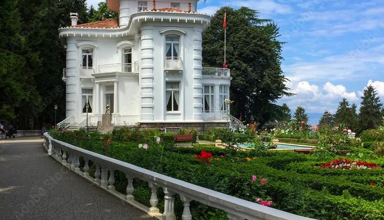 The garden and beautiful house of Ataturk's which is a museum today. Atatürk pavilion in Trabzon on a blue sky day with clouds.